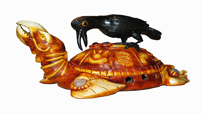 Grackle and turtle sculpture. 