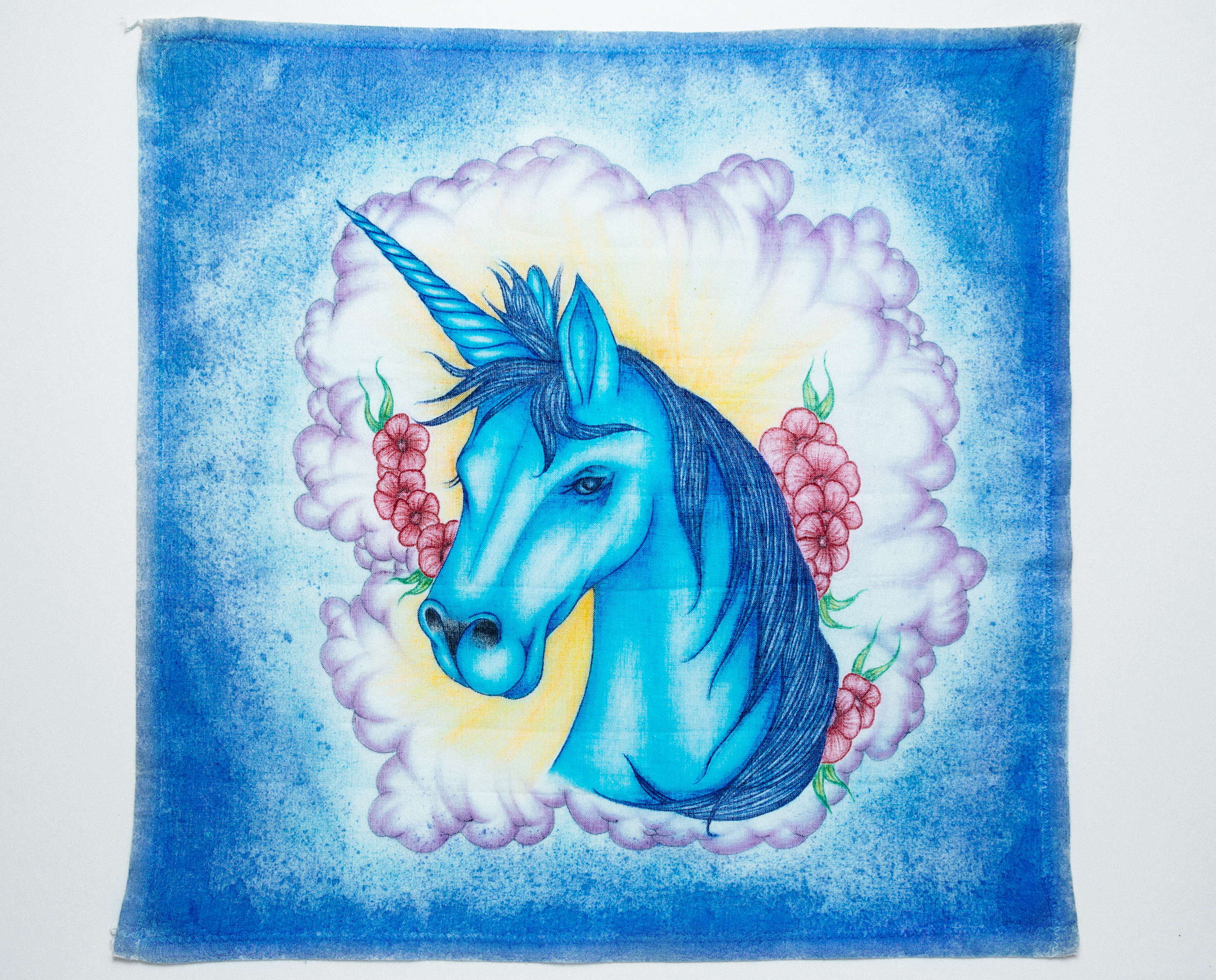 A paño of a blue unicorn. 