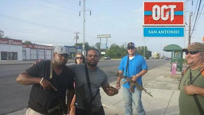 Men carrying guns. 